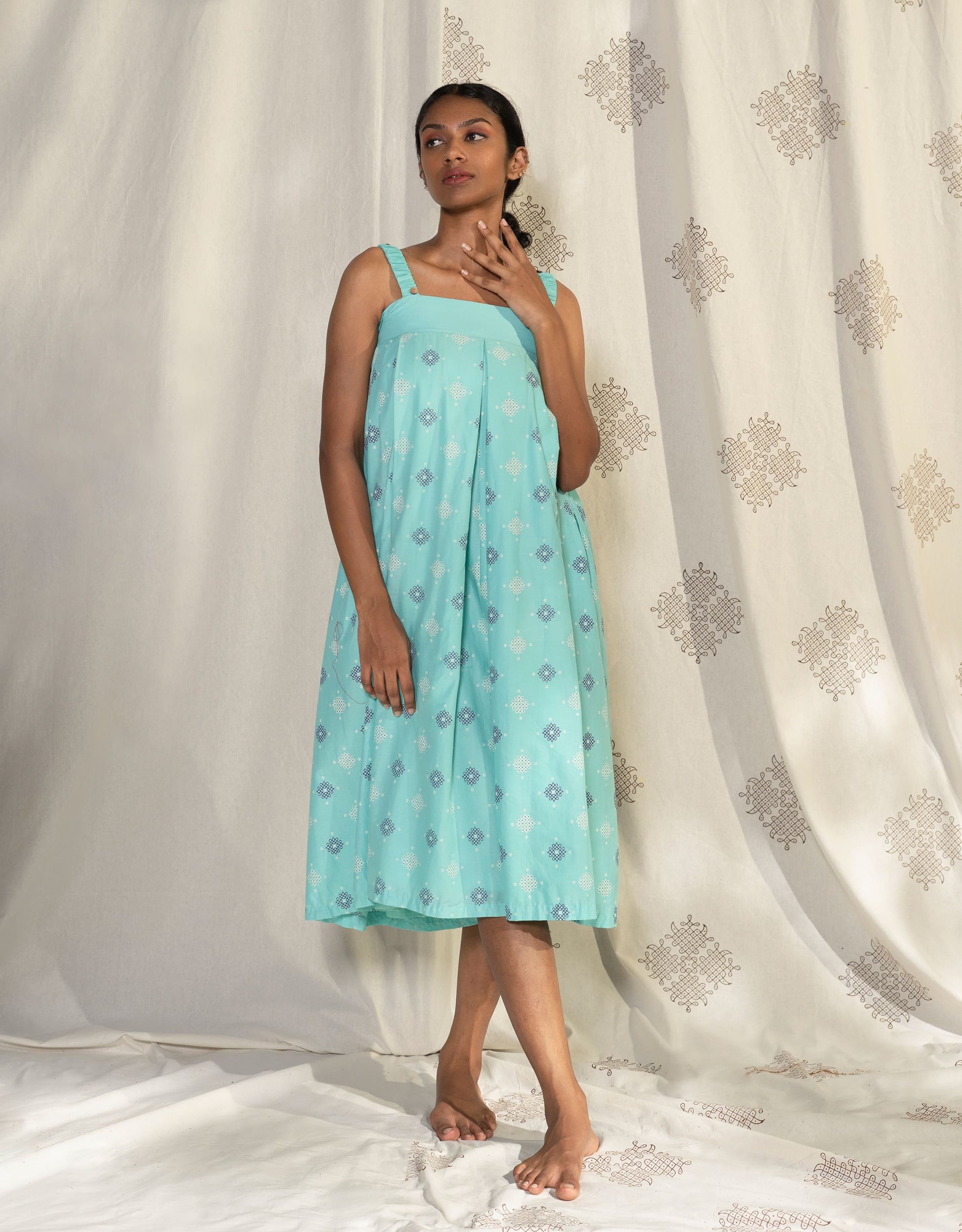 Hueloom mint blue pleated convertible jumpsuit with detachable sleeve front view showing without sleeve option