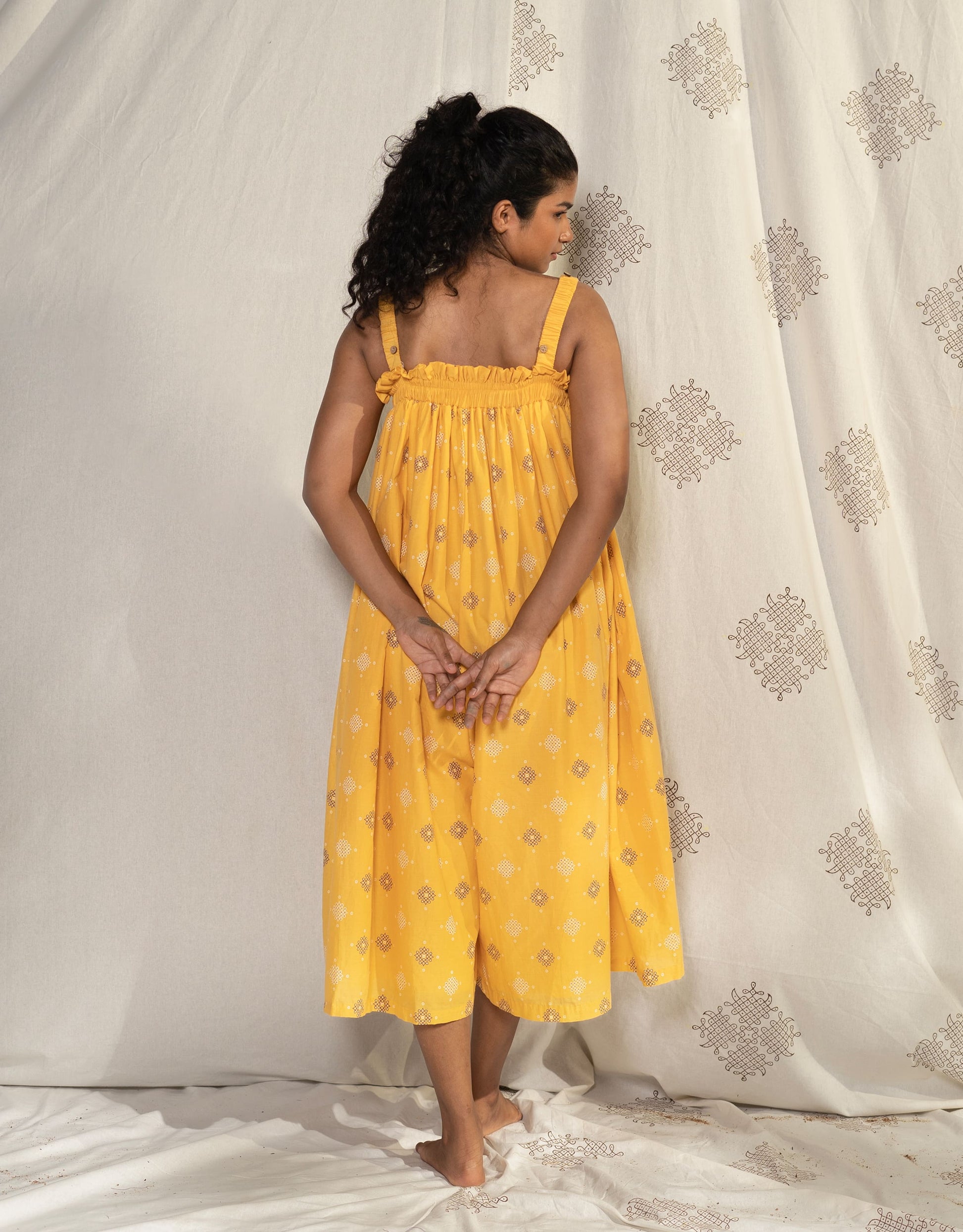 Hueloom yellow pleated convertible jumpsuit back view display