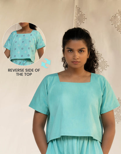 Front view of Hueloom's Reversible Boxy Top in Mint blue showing versatile reversible option with Kolam print