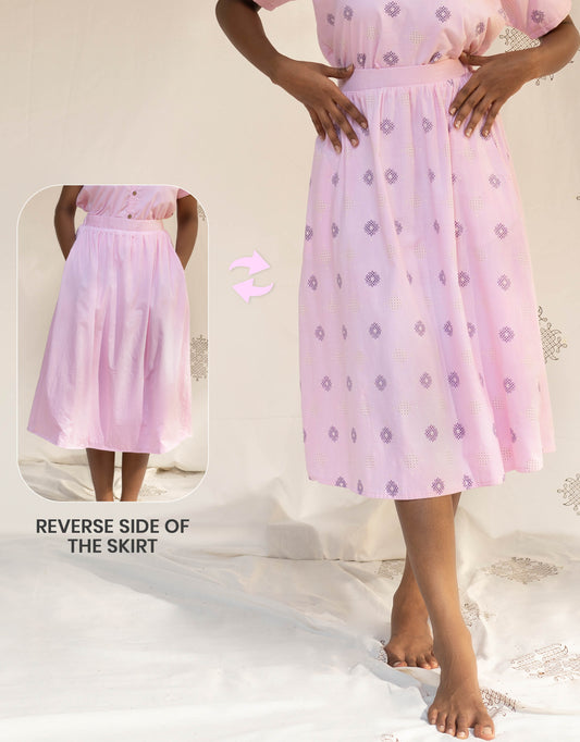 Front view of Hueloom's Reversible Midi Skirt in Light Pink Kolam print showing versatile reversible option