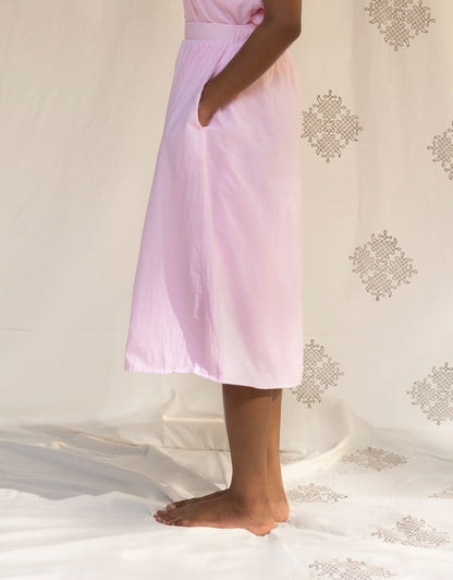 Side view of Hueloom's Reversible Midi Skirt in Light Pink