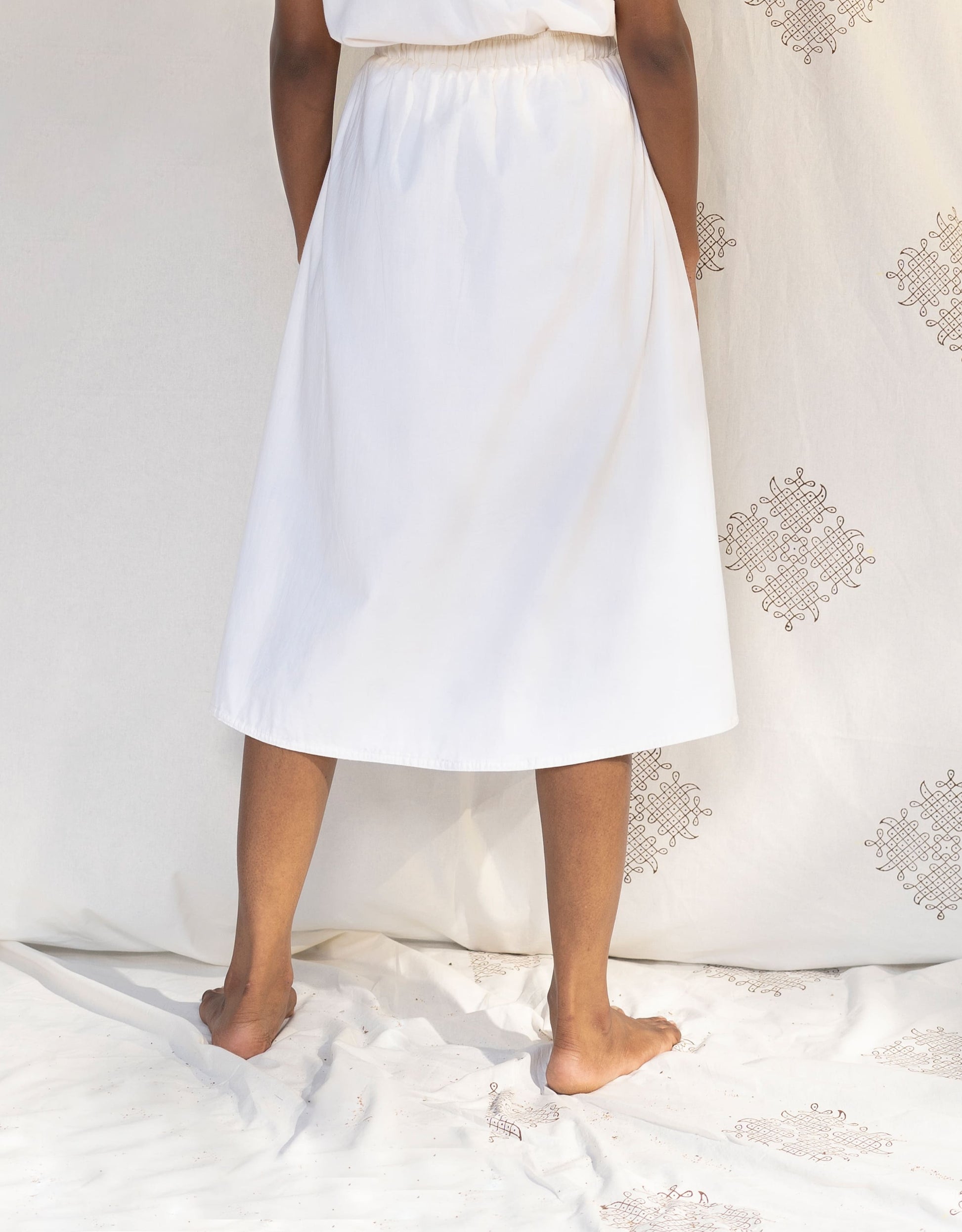 Back view of Hueloom's Reversible Midi Skirt in Off-White