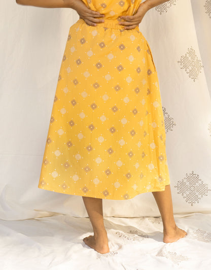 Back view of Hueloom's Reversible Midi Skirt in Yellow Kolam print.