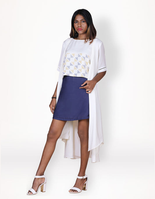 Front view of Hueloom's reversible skirt in navy with ensemble.