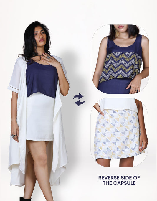Hueloom's starlet capsule with wrap dress, top and skirt in white and navy kolam print with reverse side.