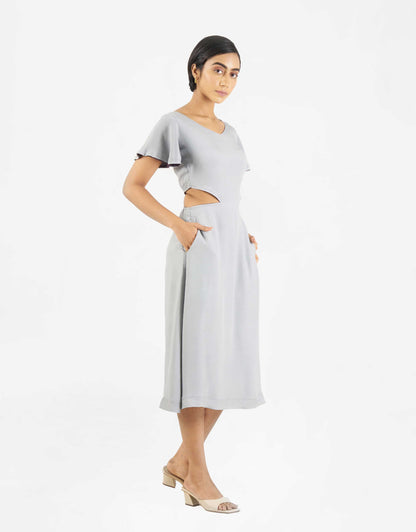 Side view of Hueloom's Reversible Cut-out dress in grey.