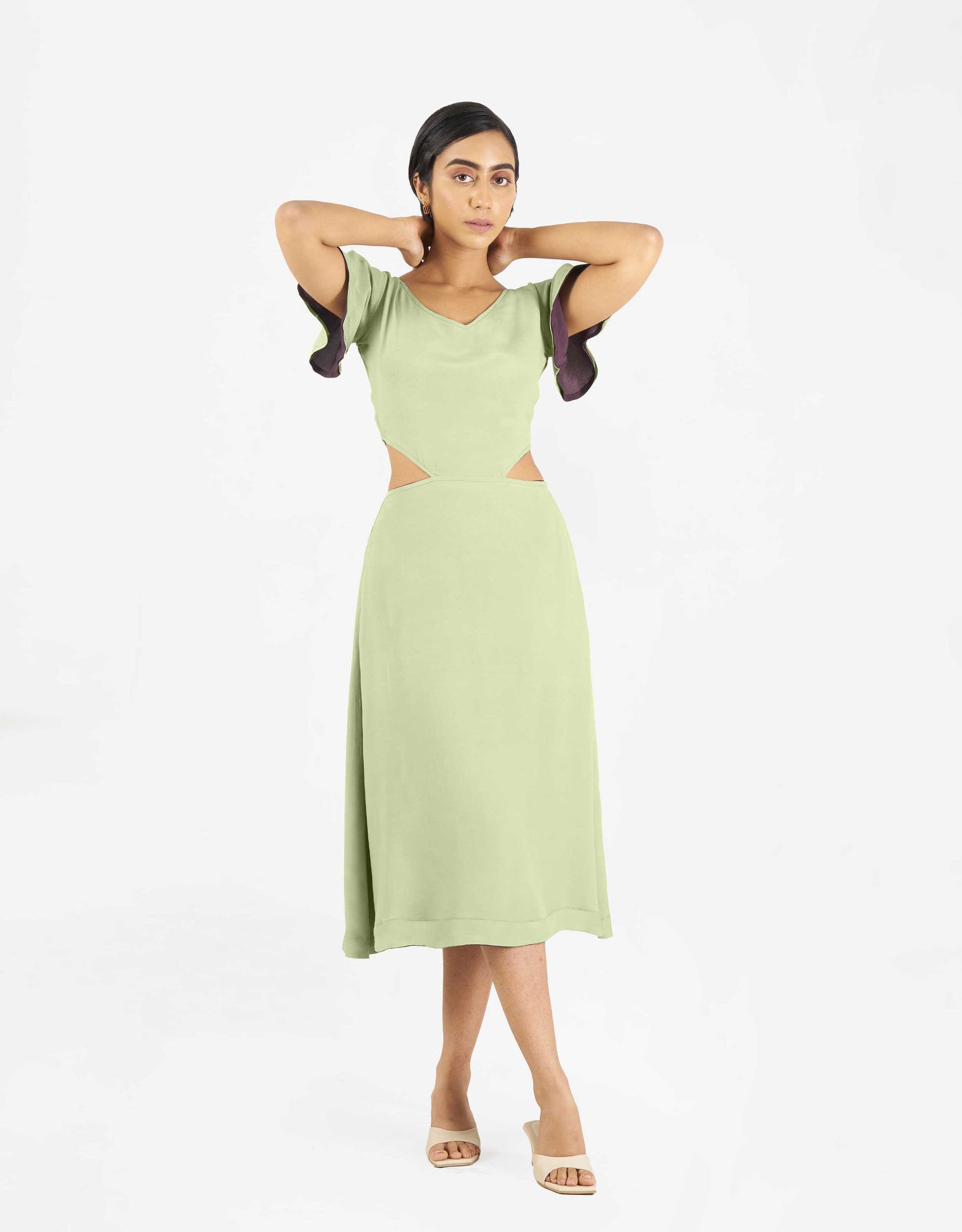 Front view of Hueloom's Reversible Cut-out dress in mint green.