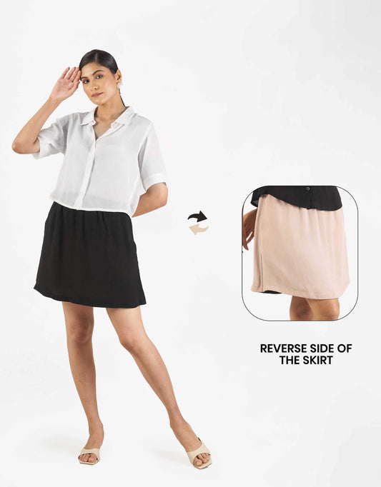 Front view of Hueloom's Reversible Skirt in black with champagne reverse side.