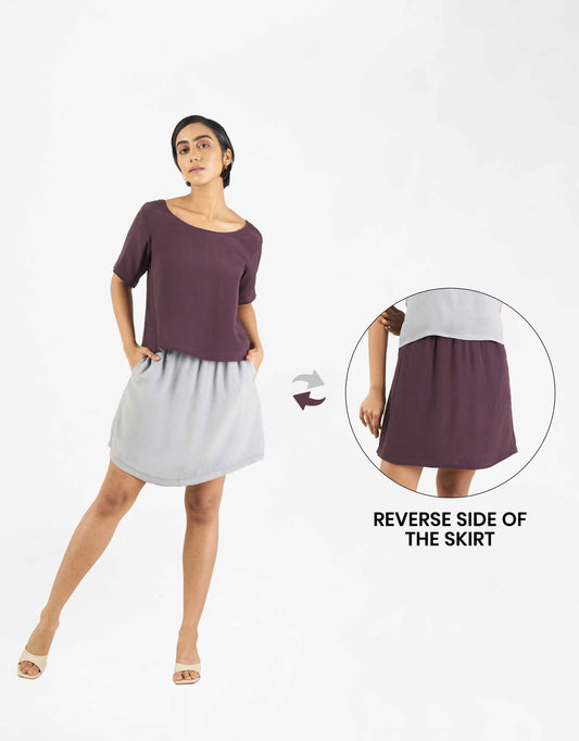 Front view of Hueloom's Reversible Skirt in grey with purple reverse side.