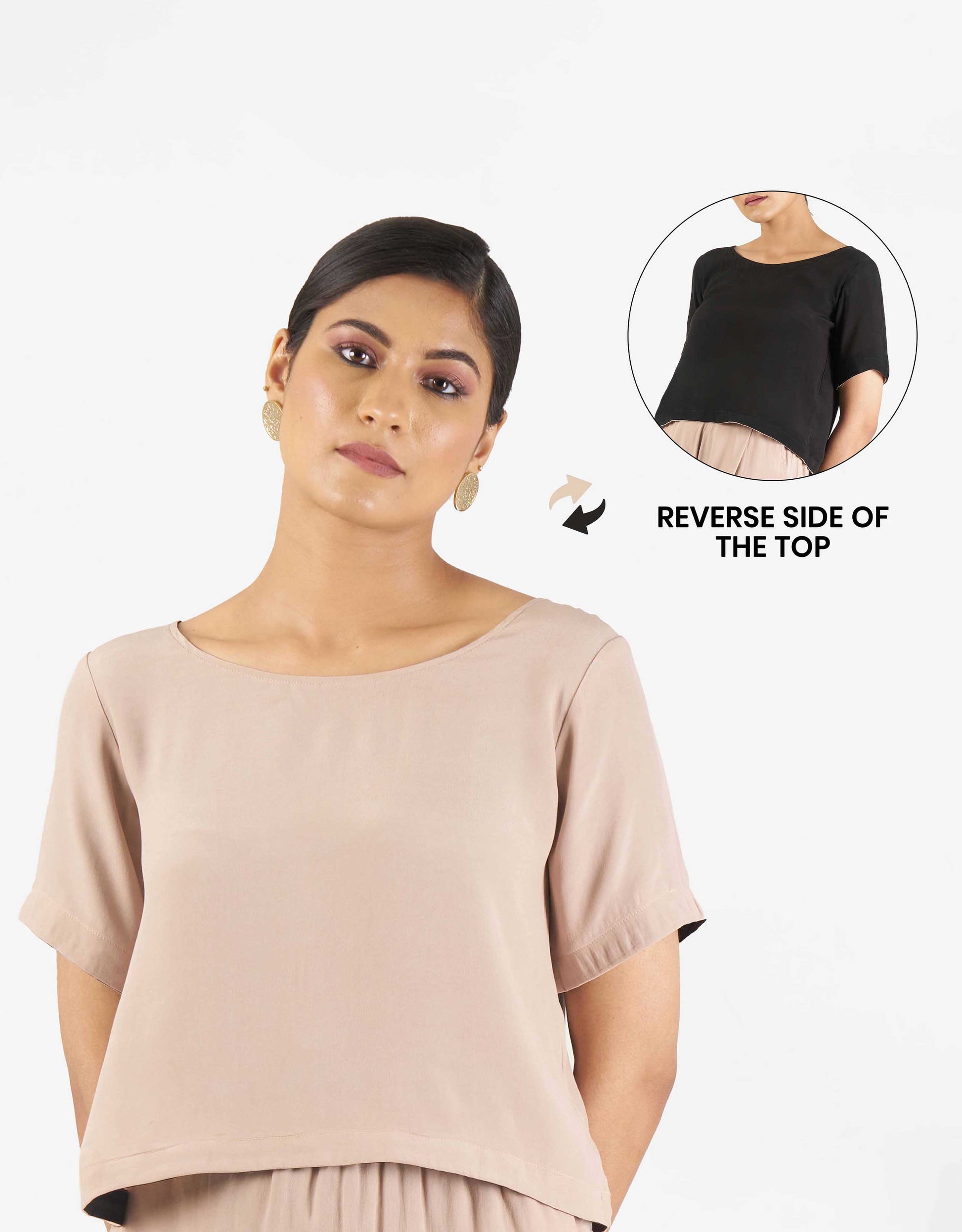 Front view of Hueloom's Reversible Top in black with champagne reverse side.