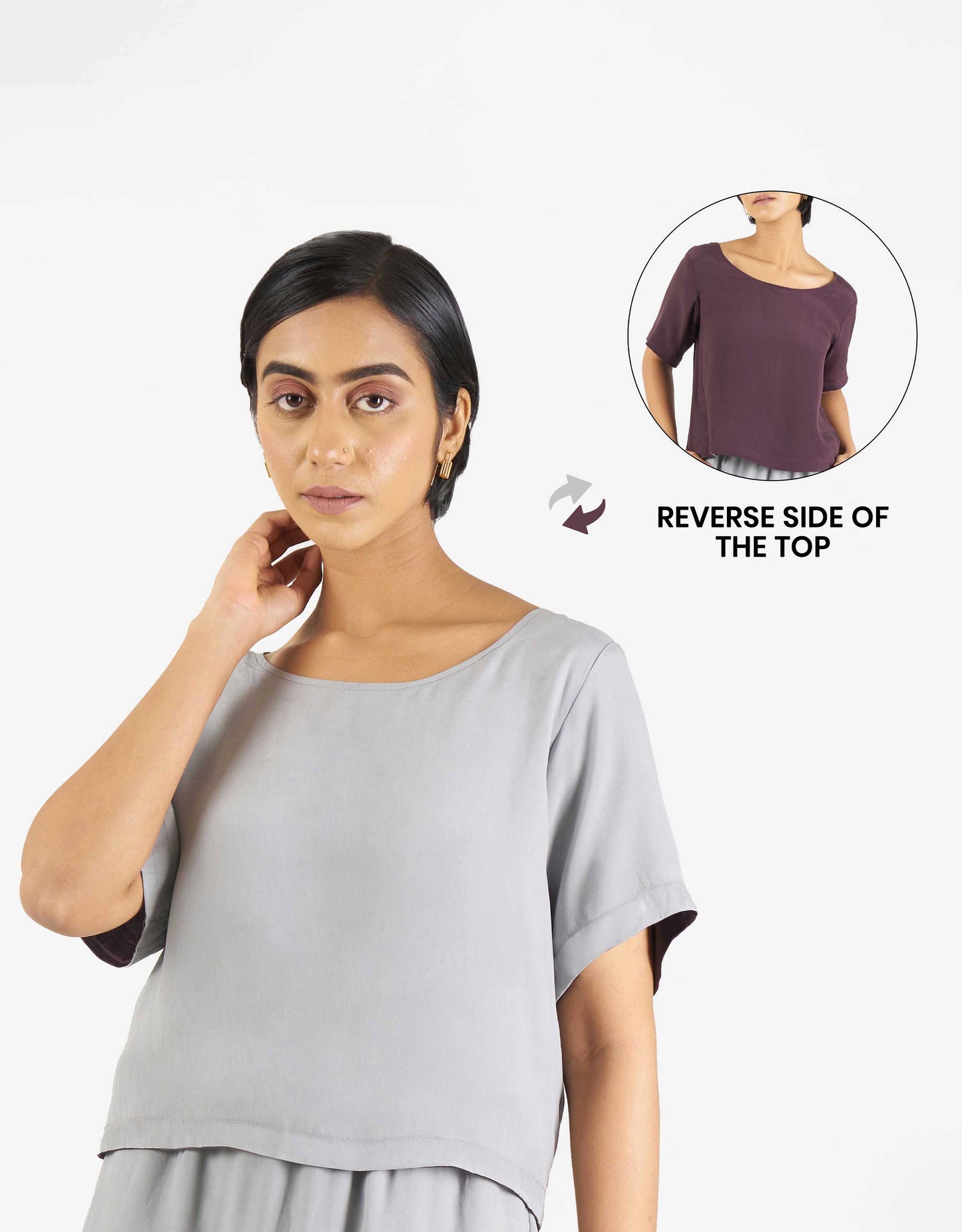 Front view of Hueloom's Reversible Top in grey with purple reverse side.